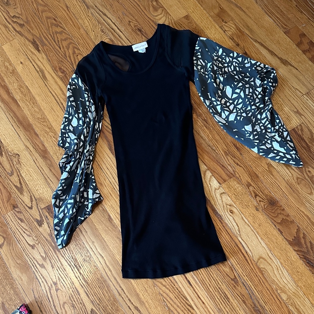 Elegant Black Top with Patterned Sleeves